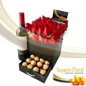 Caja con cajón de chocolates ferrero y rosas rojas con vino