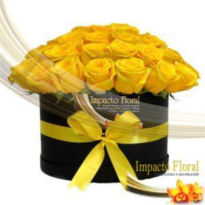 Caja redonda de rosas amarillas